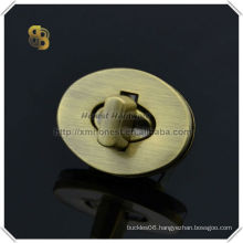 handbag hardware turn lock in brushed antique brass color